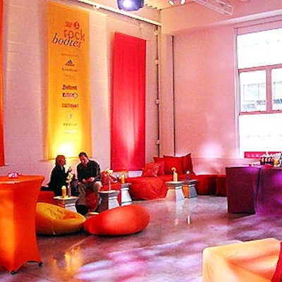 Low lounge furniture and fabric-covered cocktail tables filled Self and VH1's Rock Bodies party at Splashlight Studios.