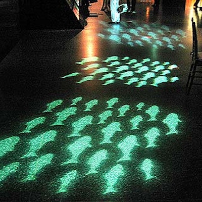 Frost Lighting decorated the floor of the American Museum of Natural History's Hall of Biodiversity with gobos of fish swimming in the direction of dinner.