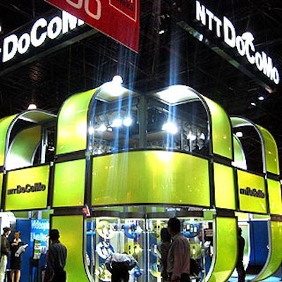 NTT Docomo's booth for Cebit America at the Javits Center enclosed showgoers in a lime green cube.