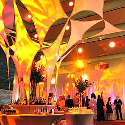 Pink Inc.'s 'Tree of Life' stretch fabric sculpture reached to the ceiling of the New York Atrium in the Westin New York—Times Square for Starwood Hotels' party for meeting and event clients in town for Meeting World.