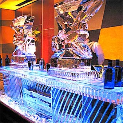 A large ice bar sponsored by Skyy vodka was illuminated with blue lights.