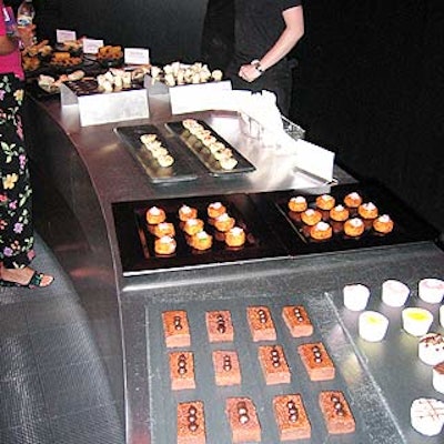 Hors d'oeuvres from Eat to the Beat were laid out on a silver steel bars.