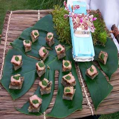 Brightly colored vintage toy cars accented a tray filled with seared steak on potato cakes. Catering was provided by Olivier Cheng Catering and Events.