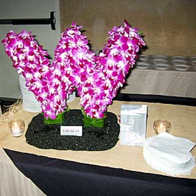 A W covered with orchids decorated the table of Icon, the in-house restaurant of the W New York—The Court.