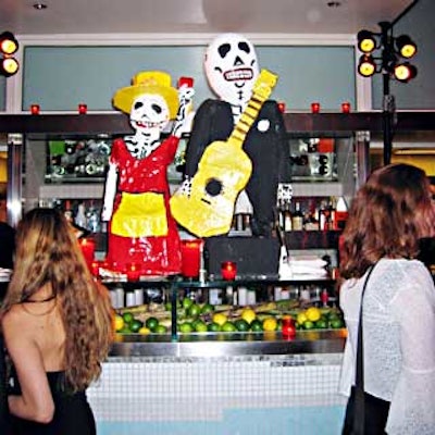 At the Once Upon a Time in Mexico premiere party at Guastavino's, Roy Braeger decorated the bar with papier-mache Day of the Dead dolls.