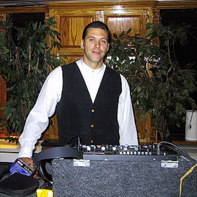 DJ Michael Anthony of The Ultimate in Entertainment kept Kstrat employees dancing.