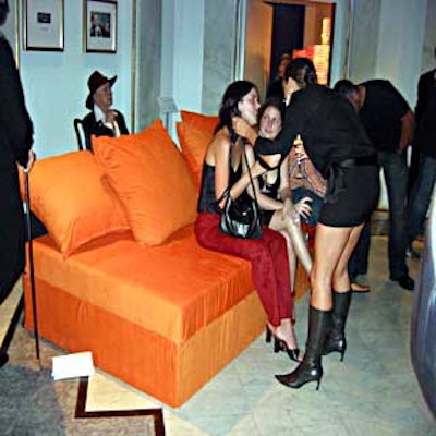 Bureau Betak brought in orange ottomans for fashion mag Visionaire's party at Madame Tussaud's.
