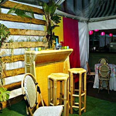Musters & Company set out wicker bars and bar stools and decorated the rear wall with giant leaves and wood beams.