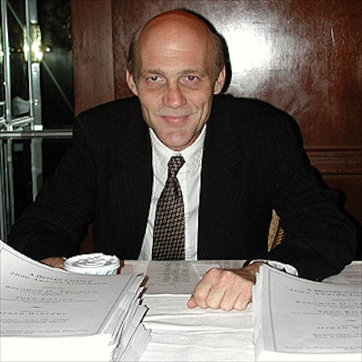 Eugene Wolf of Vantage Consulting Group helped check in guests at the A Better Chance luncheon.
