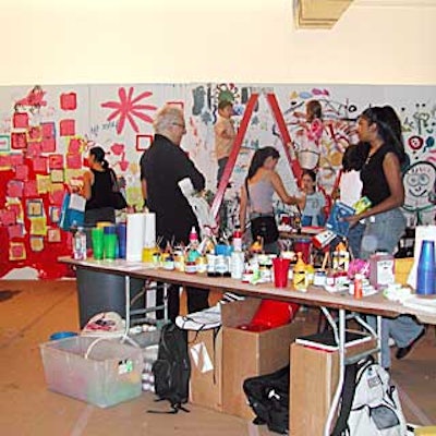 Kids could show off their artistic talents alongside famous artists in an art studio set up with buckets of paint and a plethora of paintbrushes.
