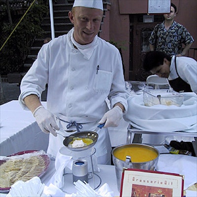 Thomas Miles, director of special events at Brasserie Bit, made cr?pes suzette for the crowd.
