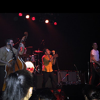 Rockabilly group The Amazing Crowns played to a half-filled Irving Plaza for the launch of Evian.com.