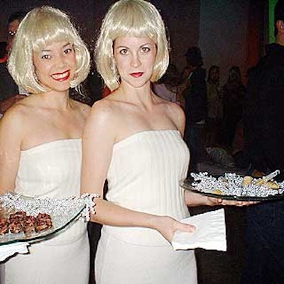 Servers clad in wooly, white floor-length skirts and white-blonde bob wigs served hors d'oeuvres from Match Catering and Eventstyles.