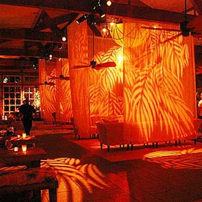 For the Out of Time premiere party at the Boathouse in Central Park, lighting designer Raymond Thompson of Images by Lighting projected gobos of palm fronds onto long, sheer white drapes that billowed from a breeze created by low-hanging ceiling fans.