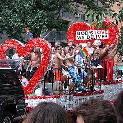 Like many floats, the God's Love We Deliver float by Bond Parade Floats featured scores of go-go boys.