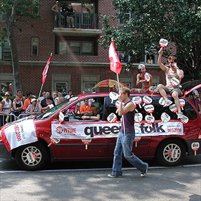 Showtime used a pretty modest float to promote its “Queer as Folk” series, but the cable network passed out paper fans, designed in-house and produced by Showtime's ad agency, The Red Group—emblazoned with provocative sayings like “bad boy” and “disco whore”—that lots of paraders carried on the route.