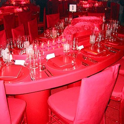At the Whitney Museum of American Art's red-themed benefit, Colin Cowie covered custom-shaped tables with red patent leather, red carnations and votive candles.