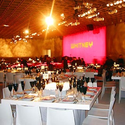 The dining room created in the fourth-floor gallery was decorated in gray with a red stripe that snaked from the elevator to the stage, bisecting the room.