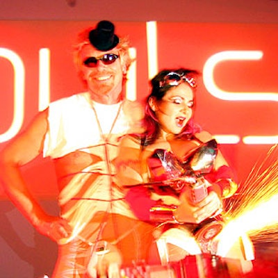 Virgin chairman Richard Branson posed with Grindergirl at the Virgin Pulse launch event at Powder.