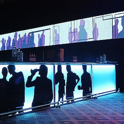 At the GQ Men of the Year awards after-party at 48 Wall Street, EventQuest's large illuminated bar with silhouettes matched some of the images projected onto screens overhead.