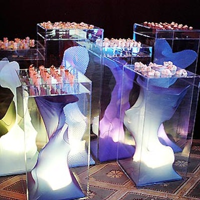EventQuest created small food stations made of Plexiglas with brightly colored fabric sculptures inside.