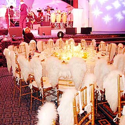 Feathery angel wings decked the chairs of the highest-level sponsors.