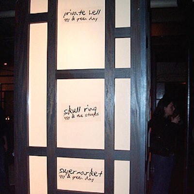 Song titles from the album adorned amber-hued backlit pillars throughout the venue, prompting songs to stick in guests' minds.