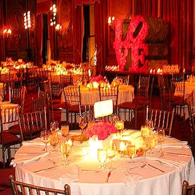 Bentley Meeker cast spotlights on each of the dinner tables, where bouquets of red roses created by DeJuan Stroud florists served as centerpieces on the dining room tables.