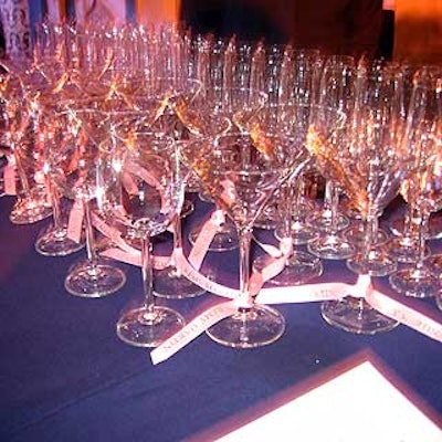 For some easy branding, white ribbons with the Remy Martin logo were tied to the martini glass stems.