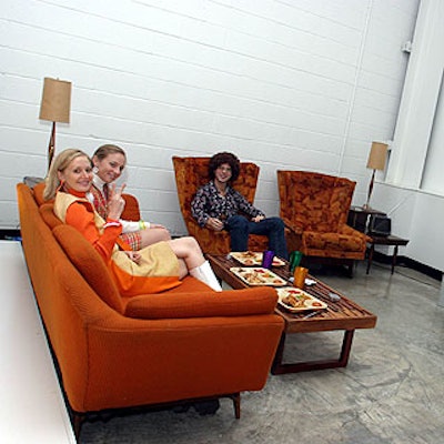 Models lounged in a 70's-inspired area at the fifth anniversary party of the Sony Wega TV at Splashlight Studios.