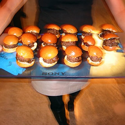Serving trays modeled after the front panels of the Sony Wega flat-screen TVs held Match Catering and Eventstyles' mini hamburgers.