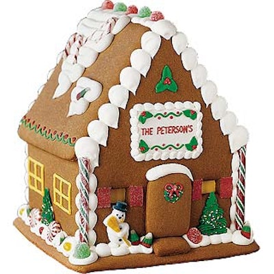 Red Envelope's gingerbread house can be customized with a company logo and serve as a great centerpiece.