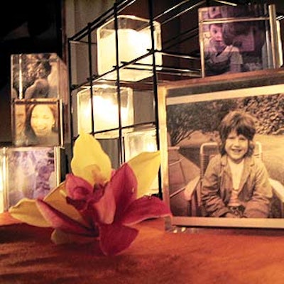 Jes Gordon suggests putting pictures of employees inside acrylic picture cubes and pairing them with votive candle towers.