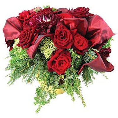 Plaza Flowers' holiday arrangements include blue spruce, pine cones, scarlet red amaryllis blooms and roses.