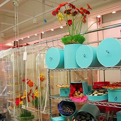 At the Container Store's opening event, David Beahm placed gerbera daisies in hat boxes and garment bags and Abigail Kirsch Culinary Productions filled round and square containers with sweets. (Photo by Patrick McMullan)