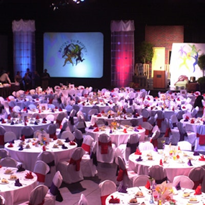 Lighting and video picked up the colors of the table settings in the converted Sound Stage #33 at Universal Orlando.