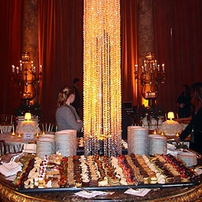 A stunning gold crystal tower atop a table of desserts commanded the center of the room.