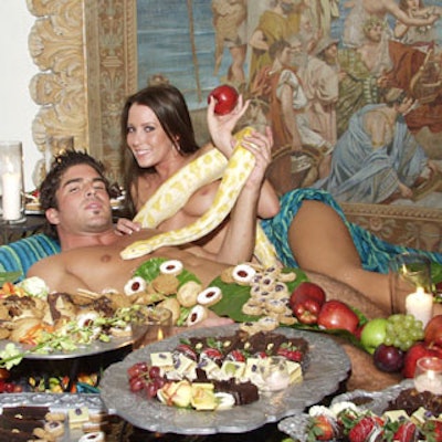 Models posing as Adam and Eve tempted guests.