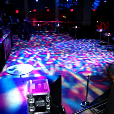 Strohmeier Lighting illuminated Teen People magazine's What's Next party at Crobar with abstract patterns of blue and purple light.