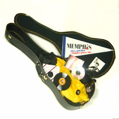 The invitation for Memphis Convention and Visitors Bureau's 50 Years of Rock 'n' Roll luncheon arrived in a full-size guitar case.