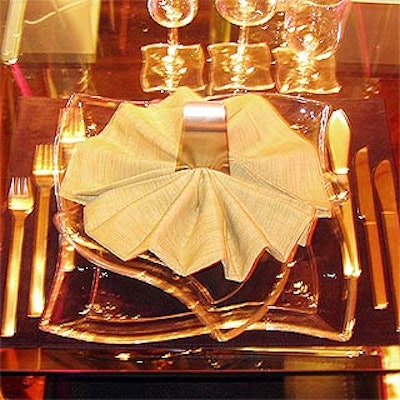 The unusual shape of the glass plates at Lladro's table matched the base of the stemware.