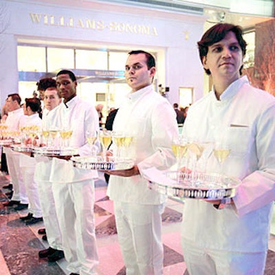 A row of white-clad Glorious Food waiters offered drinks to the approximately 6,000 guests. The vast menu included caviar, foie gras, tuna rillettes, croque monsieur, and mini BLTs—bacon, lettuce and truffle sandwiches.