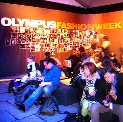 Fashion Week showgoers relaxed at the W hotels lounge in front of Olympus' 'Great Wall of Photography' in the Bryant Park tents.