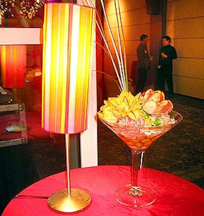 Flower arrangements and striped lamps in 60's-inspired colors contributed to the lounge look of the party.