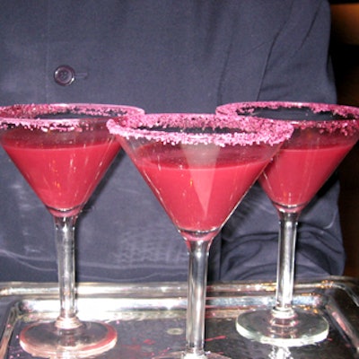 The event began with 'Cosmic Cocktails,' including the now-ubiquitous pomegranate martini dipped in red sugar crystals.