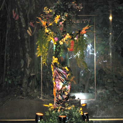 A performer dressed as a tree—no doubt with arms of steel—welcomed guests to the earth-themed Hall of Biodiversity.