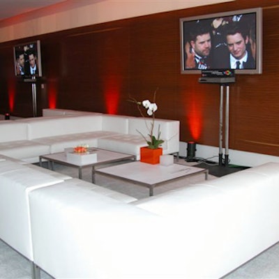 Seating was stark and simple in silver and white.