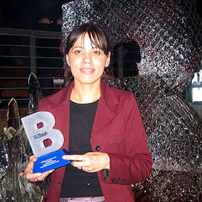 EventQuest co-executive producer Mia Choi, who picked up two awards on behalf of her company, posed in front of a BiZBash-branded ice sculpture by Okamoto Studio.