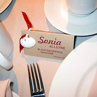 BCF&M ornamented guests' name cards with seashells and ribbons.