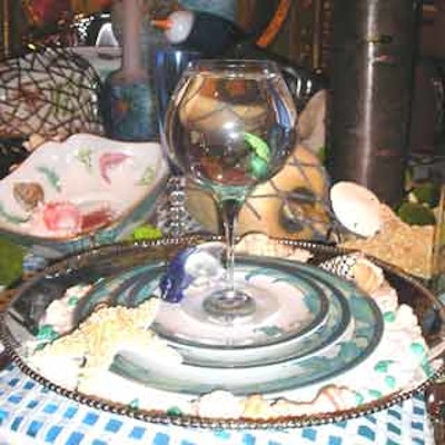 Colorful beach-glass and seashells enhanced the 'Tropical Treasures' table. The real treat, however, were live fish that swam inside goblets at each place setting.